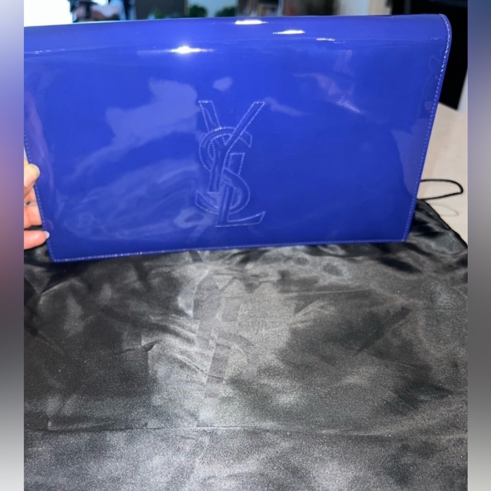 Authentic YSL Clutch in Blue Patent Leather.